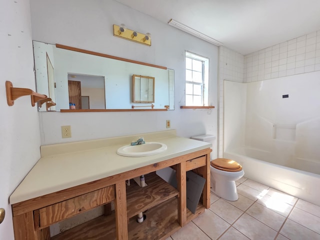 900 Mariner St, Sargent, TX 77414 - full bath featuring toilet, shower / bathing tub combination, tile patterned flooring, and vanity