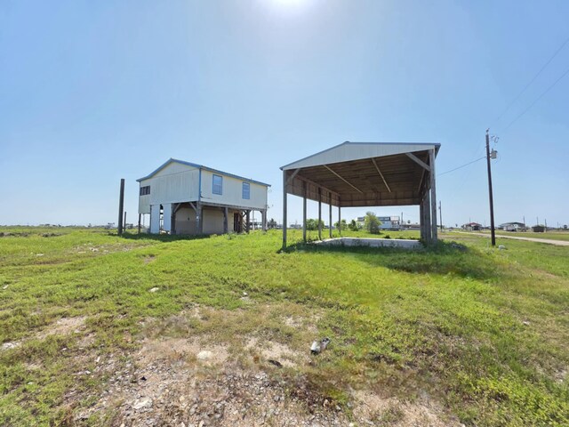 900 Mariner St, Sargent, TX 77414 - view of yard with a carport