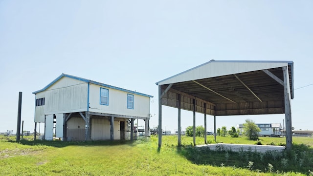 900 Mariner St, Sargent, TX 77414 - view of outbuilding featuring a detached carport