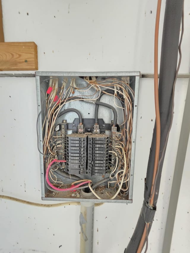 900 Mariner St, Sargent, TX 77414 - utility room featuring electric panel