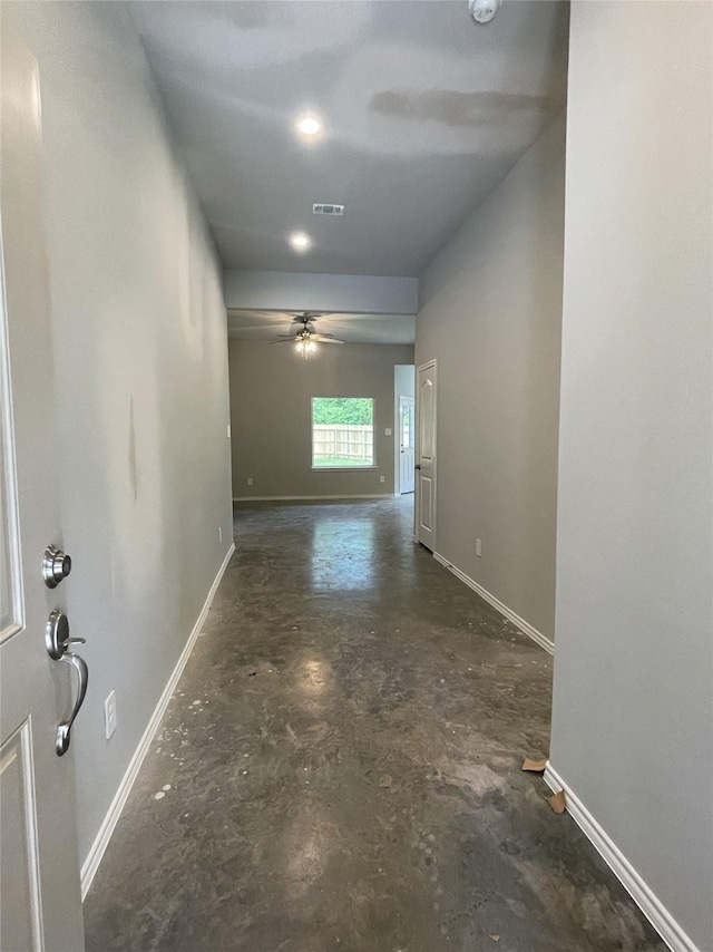 15838 Aspen Dr, Montgomery, TX 77356 - corridor with unfinished concrete flooring and baseboards