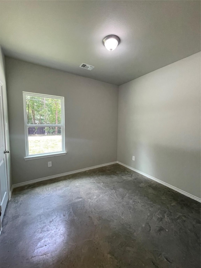15838 Aspen Dr, Montgomery, TX 77356 - empty room with concrete flooring and baseboards