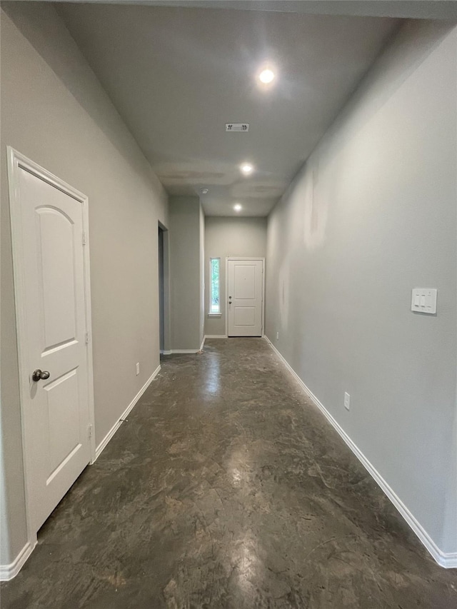 15838 Aspen Dr, Montgomery, TX 77356 - corridor featuring concrete floors, baseboards, and recessed lighting