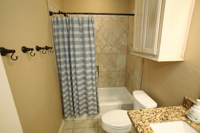 full bath with tile patterned floors, shower / bath combination with curtain, and toilet