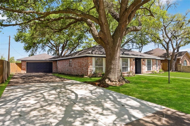 12418 A Bar Dr, Santa Fe, TX 77510 - single story home with brick siding, driveway, and a garage