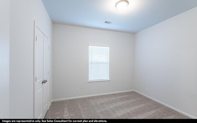 3218 Cornflower Coast Ct, Texas City, TX 77568 - carpeted spare room with baseboards and visible vents