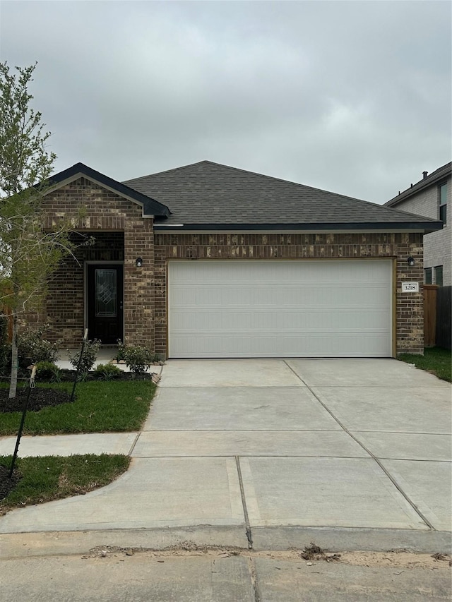 3218 Cornflower Coast Ct, Texas City, TX 77568 - ranch-style home with brick siding, a garage, driveway, and roof with shingles