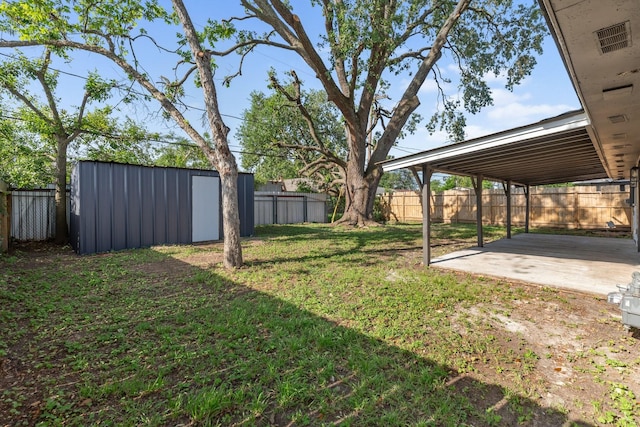 view of yard featuring a fenced backyard, an outbuilding, and a storage shed