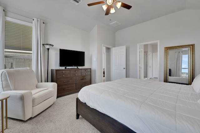 bedroom featuring light carpet, ceiling fan, and vaulted ceiling