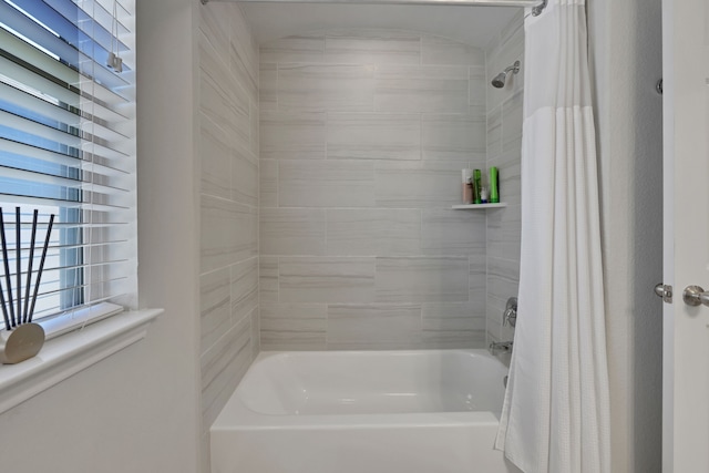 bathroom with shower / tub combo