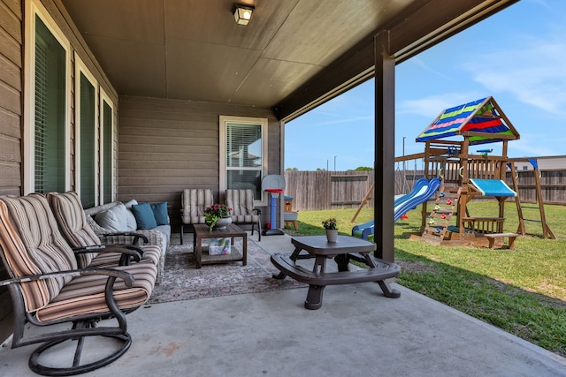 view of patio featuring a playground and an outdoor hangout area