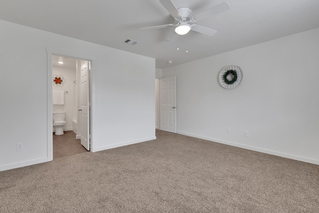 12603 Telge Rd Unit 30C-D, Cypress, TX 77429 - unfurnished bedroom with carpet floors, baseboards, and ensuite bath