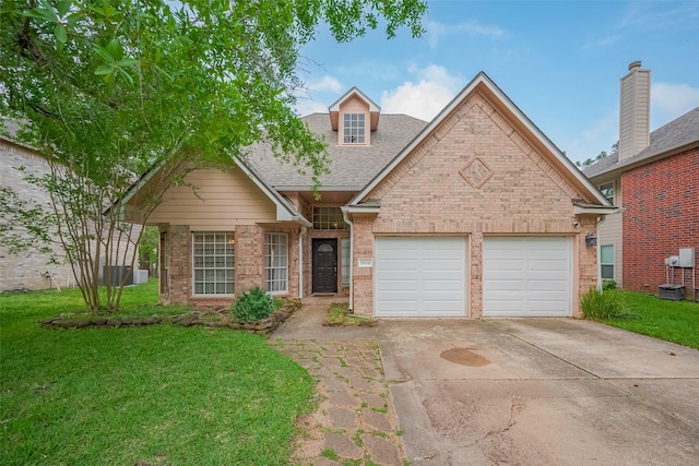 18914 Hikers Trail Dr, Humble, TX 77346 - traditional-style house with concrete driveway, an attached garage, a front yard, and brick siding