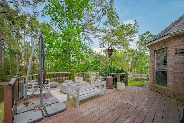 18914 Hikers Trail Dr, Humble, TX 77346 - wooden terrace with view of wooded area