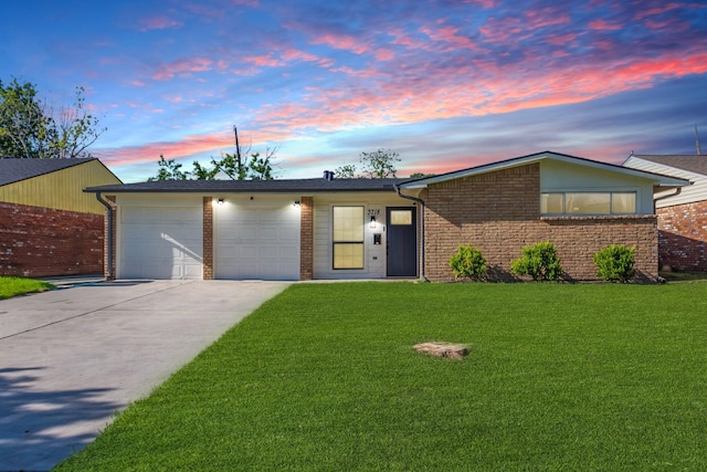 3718 Prudence Dr, Houston, TX 77045 - mid-century inspired home with concrete driveway, a front yard, brick siding, and a garage