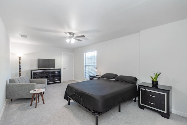 3718 Prudence Dr, Houston, TX 77045 - bedroom with light carpet, ceiling fan, baseboards, and visible vents