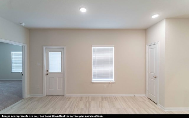 922 Alaska Cedar Dr, Crosby, TX 77532 - entrance foyer with recessed lighting and baseboards