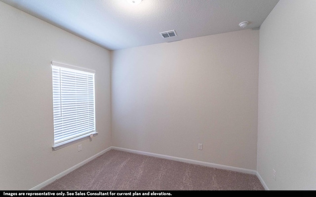 922 Alaska Cedar Dr, Crosby, TX 77532 - carpeted spare room with baseboards and a smoke detector