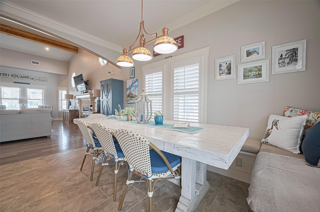 dining space with recessed lighting, a fireplace, visible vents, and crown molding