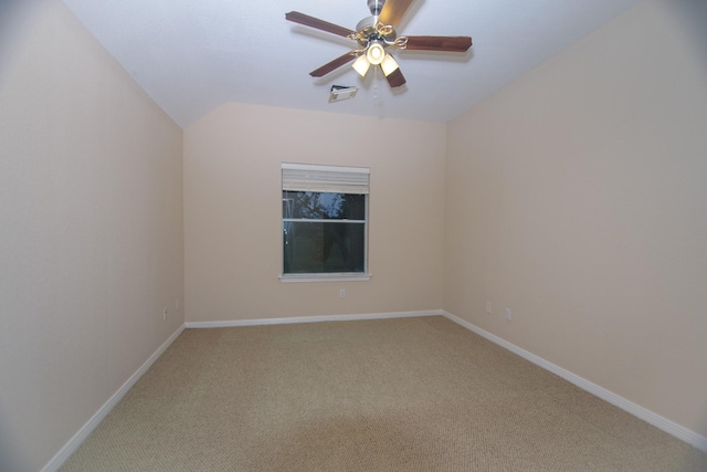 spare room featuring baseboards, visible vents, light carpet, and ceiling fan