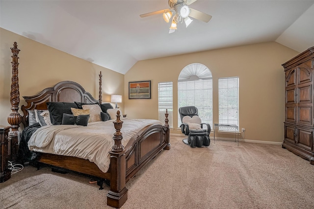 bedroom featuring baseboards, a ceiling fan, vaulted ceiling, and light colored carpet