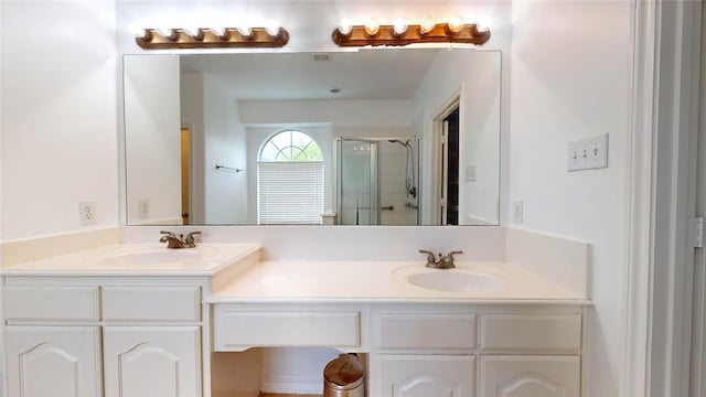 16410 Bluff Springs Dr, Houston, TX 77095 - full bathroom featuring a stall shower, double vanity, and a sink