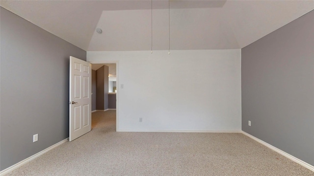 16410 Bluff Springs Dr, Houston, TX 77095 - carpeted empty room featuring baseboards and vaulted ceiling