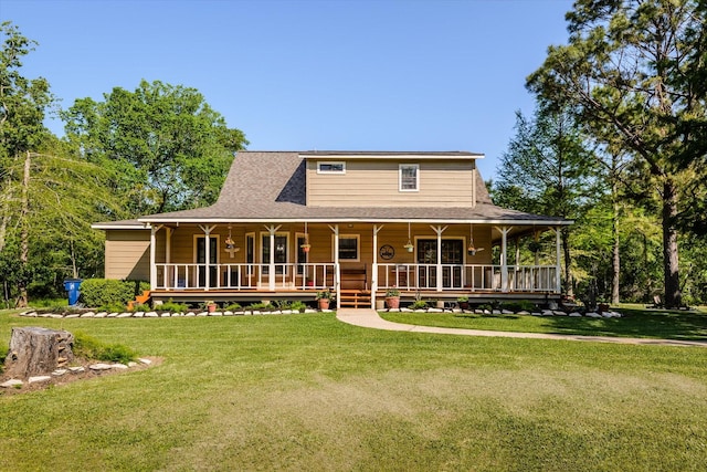 view of front of home featuring a front yard and a porch