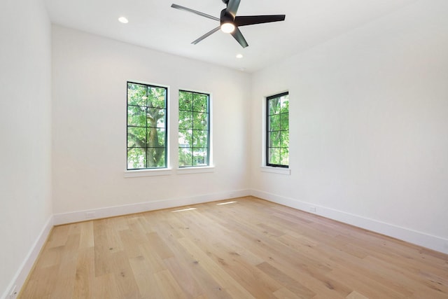 unfurnished room featuring recessed lighting, light wood finished floors, baseboards, and a ceiling fan
