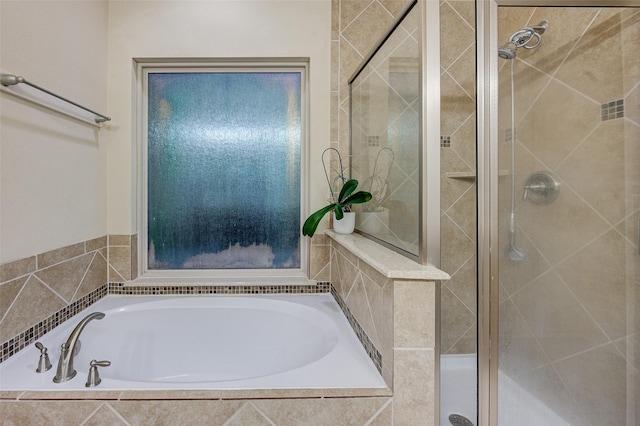 8719 Seguin Cove Ln, Richmond, TX 77407 - full bathroom with a shower stall and a bath