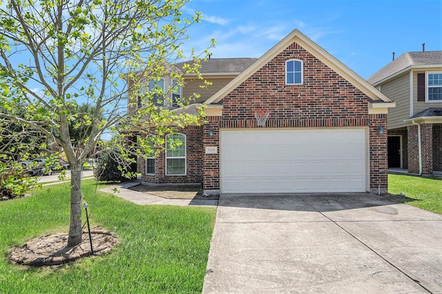 5318 El Tigre Ln, Baytown, TX 77521 - traditional-style home featuring an attached garage, concrete driveway, a front lawn, and brick siding