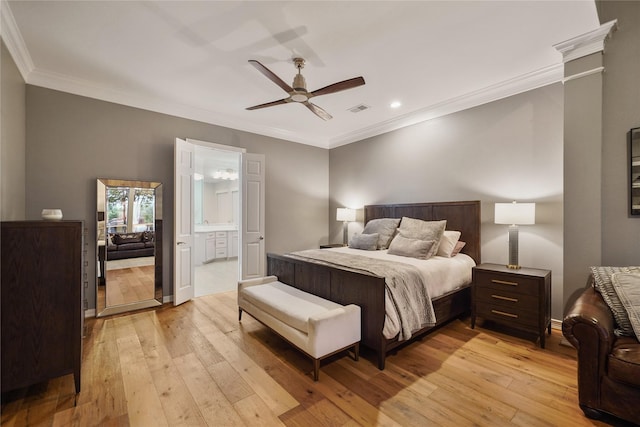 bedroom with light wood-type flooring, crown molding, and visible vents