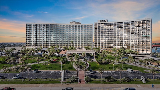 5220 Seawall Blvd Unit 1134C, Galveston, TX 77551 - view of building exterior with uncovered parking
