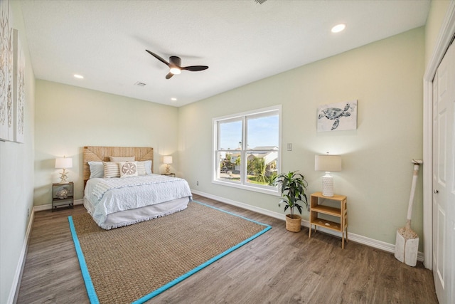 1322 Outrigger, Tiki Island, TX 77554 - bedroom featuring visible vents, baseboards, and wood finished floors