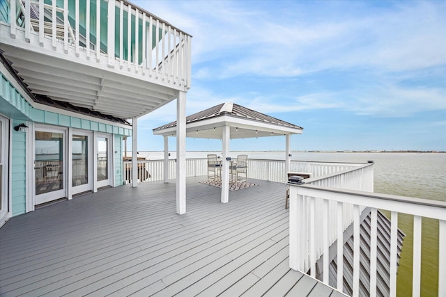 1322 Outrigger, Tiki Island, TX 77554 - deck with a water view, a gazebo, and outdoor dining area