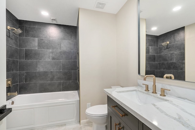 full bath featuring toilet, vanity, tub / shower combination, and visible vents