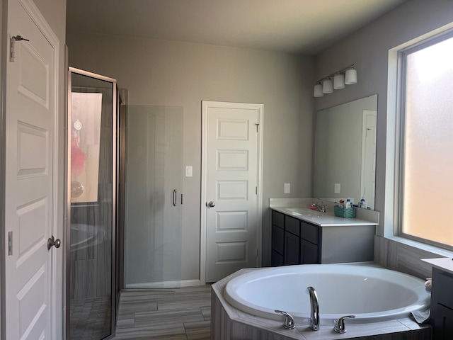 10427 Cecilia Star Ln, Richmond, TX 77406 - full bath featuring a bath, a shower stall, and vanity