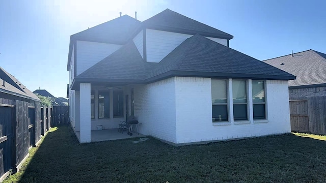 10427 Cecilia Star Ln, Richmond, TX 77406 - view of side of home featuring a patio area, a fenced backyard, and a lawn