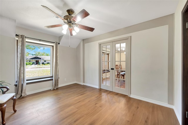 18614 Prince William Ln, Houston, TX 77058 - interior space with light wood-style floors, baseboards, ceiling fan, and french doors