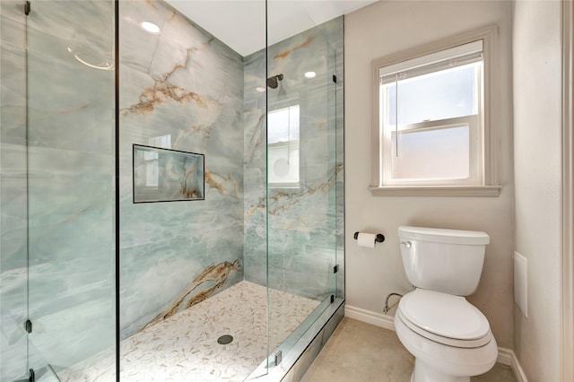 18614 Prince William Ln, Houston, TX 77058 - full bathroom featuring baseboards, toilet, and a stall shower