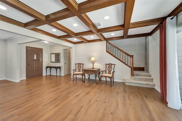 18614 Prince William Ln, Houston, TX 77058 - living area featuring baseboards, coffered ceiling, stairs, and visible vents
