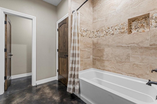 full bath with baseboards, concrete floors, and shower / bath combination with curtain