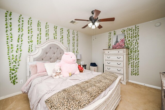 bedroom with baseboards, a ceiling fan, visible vents, and light colored carpet