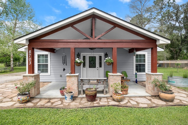 8703 County Road 48, Rosharon, TX 77583 - view of front of home with a porch
