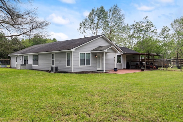 8703 County Road 48, Rosharon, TX 77583 - rear view of house with a patio and central AC unit