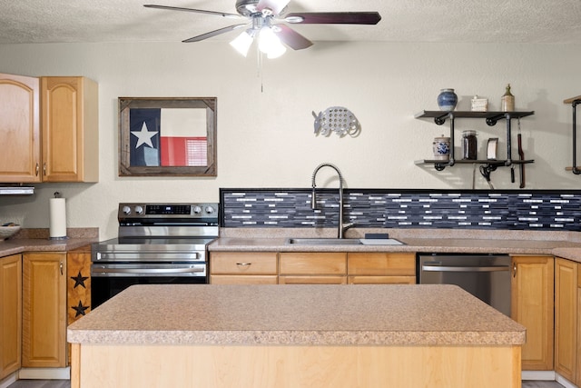 8703 County Road 48, Rosharon, TX 77583 - kitchen featuring stainless steel appliances, a sink, ceiling fan, light brown cabinets, and a textured ceiling