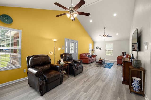 8703 County Road 48, Rosharon, TX 77583 - living area with a ceiling fan, high vaulted ceiling, light wood-type flooring, baseboards, and recessed lighting