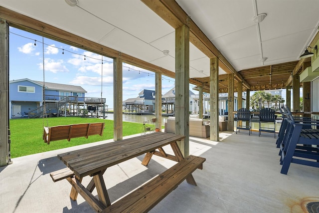 23006 Martes St, Galveston, TX 77554 - view of patio / terrace with a water view