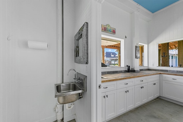 23006 Martes St, Galveston, TX 77554 - bathroom featuring plenty of natural light, wood finished floors, and vanity