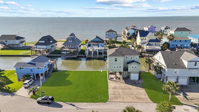 23006 Martes St, Galveston, TX 77554 - aerial perspective of suburban area with a nearby body of water